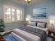 Virtually staged bedroom with wood floors at 903 Pinellas Bayway S # 302, Tierra Verde, FL 33715