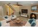 Spacious living room with fireplace and ample natural light at 903 Pinellas Bayway S # 302, Tierra Verde, FL 33715