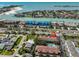 Aerial view showcasing the community's proximity to the beach and waterways, marked by the red circle at 903 Pinellas Bayway S # 302, Tierra Verde, FL 33715