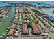Expansive aerial view showcasing the waterfront community and its convenient location near the beach at 903 Pinellas Bayway S # 302, Tierra Verde, FL 33715