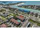 Scenic aerial view of the community near the waterfront, highlighting nearby coastal amenities and location at 903 Pinellas Bayway S # 302, Tierra Verde, FL 33715