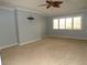 Bright bedroom features new floors, a large window, and fresh paint at 903 Pinellas Bayway S # 302, Tierra Verde, FL 33715