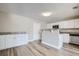 Modern kitchen with white cabinets and granite countertops at 11335 Pickford St, Spring Hill, FL 34609