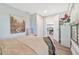 Cozy bedroom with a view into the kitchen and dining area at 901 Don Juan Ct, Punta Gorda, FL 33950