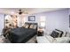 Relaxing primary bedroom featuring a ceiling fan and calming wall art at 901 Don Juan Ct, Punta Gorda, FL 33950