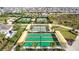 Community bocce ball courts with shade canopies at 10342 Echo Dock Loop, San Antonio, FL 33576