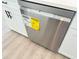 Stainless steel dishwasher with energy guide sticker at 1294 Napoleon Rd, North Port, FL 34288