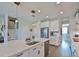 Bright, modern kitchen with a quartz island, stainless steel appliances, and open layout at 19293 Breynia Dr, Lutz, FL 33558