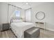 Charming bedroom with a queen-size bed and gray accents at 307 Shore Crab Way, Apollo Beach, FL 33572