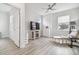 Bright and airy common area with TV, fireplace, and comfortable seating at 307 Shore Crab Way, Apollo Beach, FL 33572
