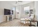 Spacious common area featuring a fireplace and large TV at 307 Shore Crab Way, Apollo Beach, FL 33572