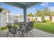 Enjoy outdoor dining on this covered patio at 307 Shore Crab Way, Apollo Beach, FL 33572