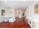 Bright dining room with hardwood floors and glass table at 340 S Palm Ave # 11, Sarasota, FL 34236
