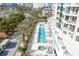 Luxury pool area, lap pool, spa, and comfortable seating at 340 S Palm Ave # 11, Sarasota, FL 34236