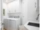 Bright laundry room with washer, dryer, and additional counter space at 340 S Palm Ave # 11, Sarasota, FL 34236