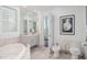 Bright bathroom with a toilet, bidet, and vanity at 340 S Palm Ave # 11, Sarasota, FL 34236