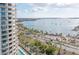 Stunning aerial view showcasing waterfront property, pool, and nearby marina at 340 S Palm Ave # 11, Sarasota, FL 34236
