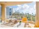 Relaxing balcony with water views and comfortable seating at 340 S Palm Ave # 11, Sarasota, FL 34236