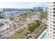 Aerial view of condo building with water and city views at 340 S Palm Ave # 11, Sarasota, FL 34236