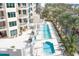 Resort-style pool area with lap pool, spa, and lounge chairs at 340 S Palm Ave # 11, Sarasota, FL 34236