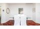Elegant dining room featuring hardwood floors and artwork at 340 S Palm Ave # 11, Sarasota, FL 34236