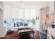 Bright library with large windows and built-in bookcases at 340 S Palm Ave # 11, Sarasota, FL 34236