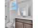 Bathroom featuring modern fixtures, vanity, and tiled shower-tub combo at 2626 Wise River Lane, Zephyrhills, FL 33539