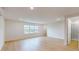 Bright bedroom featuring hardwood floors and a private bath at 3611 Lajuana Blvd, Wesley Chapel, FL 33543