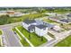 Two-story house and detached garage viewed from above at 3611 Lajuana Blvd, Wesley Chapel, FL 33543