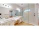 Bathroom with double vanity and walk-in shower at 3611 Lajuana Blvd, Wesley Chapel, FL 33543