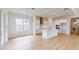 Modern kitchen with white cabinets, island, and stainless steel appliances at 3611 Lajuana Blvd, Wesley Chapel, FL 33543