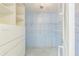 Walk-in closet features ample shelving and storage options, plus hanging storage at 13619 Twin Lakes Ln # 15, Tampa, FL 33618