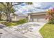 Charming villa with a one car garage and a long driveway at 13619 Twin Lakes Ln # 15, Tampa, FL 33618