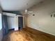 Spacious bedroom with hardwood floors, double closets, and ceiling fan at 13619 Twin Lakes Ln # 15, Tampa, FL 33618