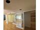 Bright living room with hardwood floors and access to other rooms at 13619 Twin Lakes Ln # 15, Tampa, FL 33618