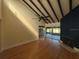 Living room featuring hardwood floors, fireplace, and access to enclosed patio at 13619 Twin Lakes Ln # 15, Tampa, FL 33618