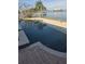 Spacious pool and patio with scenic waterfront views at 501 55Th Ave, St Pete Beach, FL 33706