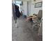Screened porch with seating and storage at 501 55Th Ave, St Pete Beach, FL 33706