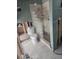 Bathroom with a walk-in shower and updated tile flooring at 501 55Th Ave, St Pete Beach, FL 33706