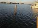 Serene waterfront view with a boat and calm water at 501 55Th Ave, St Pete Beach, FL 33706