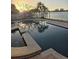 Relaxing pool and spa overlooking the water at sunset at 501 55Th Ave, St Pete Beach, FL 33706