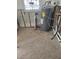 Unfinished basement with water heater and tile floor at 501 55Th Ave, St Pete Beach, FL 33706