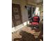 Cozy front porch with seating and tiled floor at 501 55Th Ave, St Pete Beach, FL 33706
