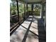 Spacious deck overlooking wooded area, perfect for outdoor relaxation at 707 George S St, Tarpon Springs, FL 34688