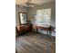 Charming bedroom with wood floors and plenty of natural light at 707 George S St, Tarpon Springs, FL 34688