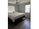Large main bedroom with a comfortable bed and ample space at 707 George S St, Tarpon Springs, FL 34688