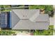 Aerial view of a home's gray roof and backyard at 1708 Hadden Hall Pl, Trinity, FL 34655