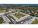 Aerial view of community; shows buildings, pool, and green space at 5095 Bay Ne St # 109, St Petersburg, FL 33703