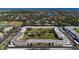 Aerial view of the community, showing buildings, pool, and landscaping at 5095 Bay Ne St # 109, St Petersburg, FL 33703