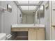 Bathroom features a large mirror and updated vanity at 5095 Bay Ne St # 109, St Petersburg, FL 33703